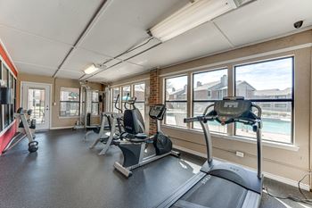 Fitness center with treadmill and recumbent bike